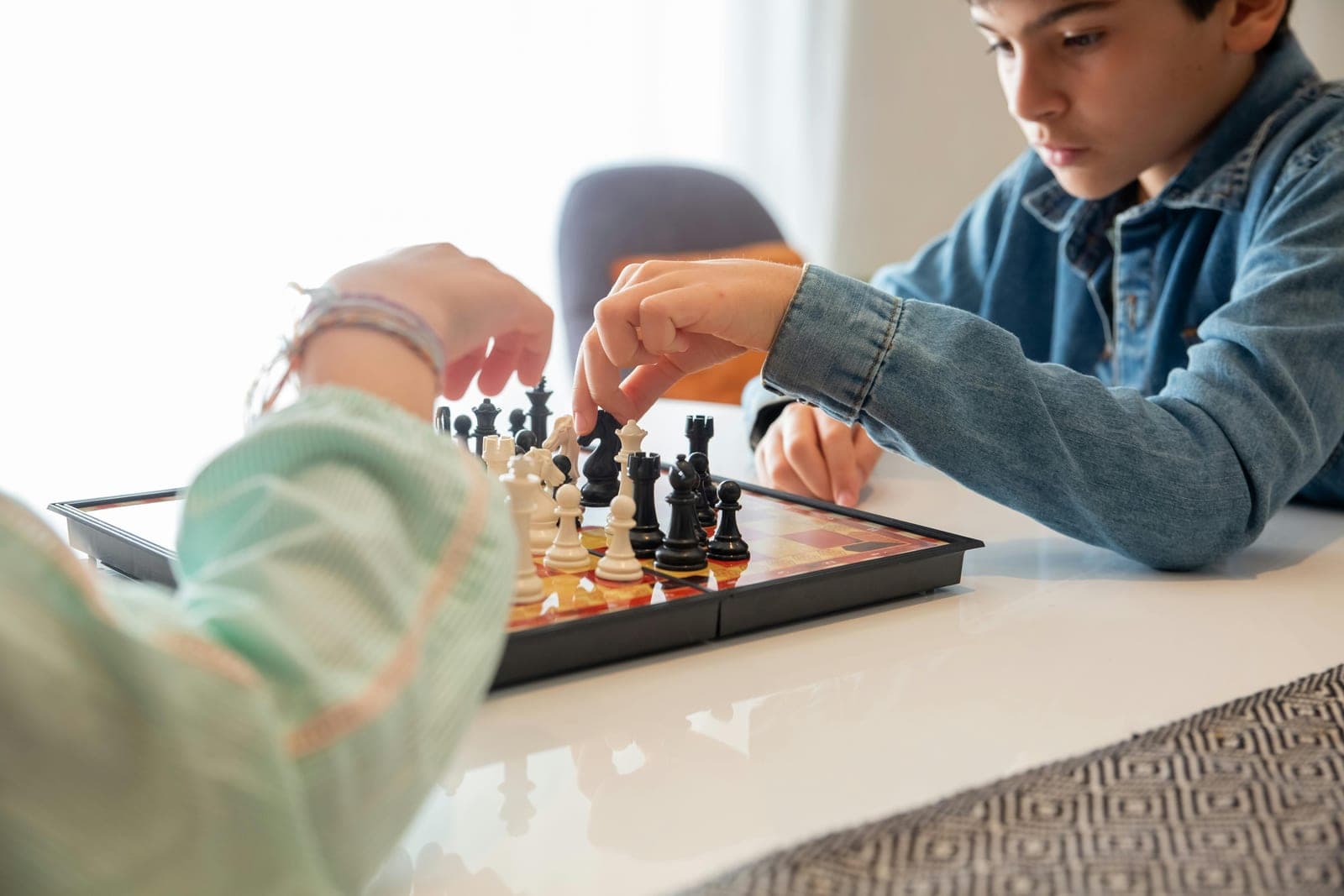 Kids playing chess at a Brooklyn summer chess camp.